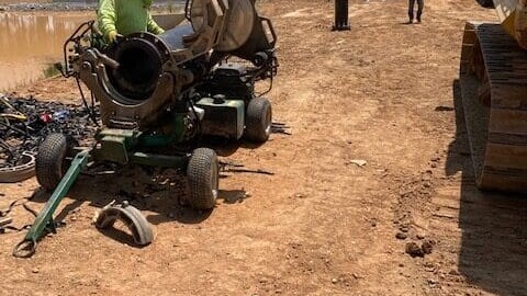 Men working on equipment