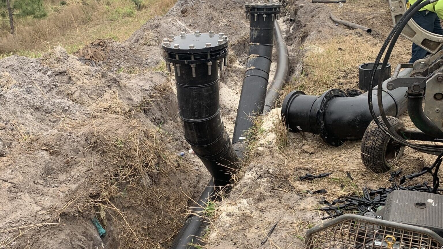 Men working on pipe installation