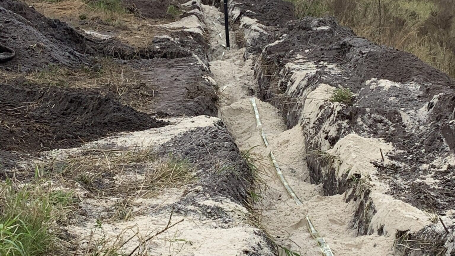 Men working on pipe installation