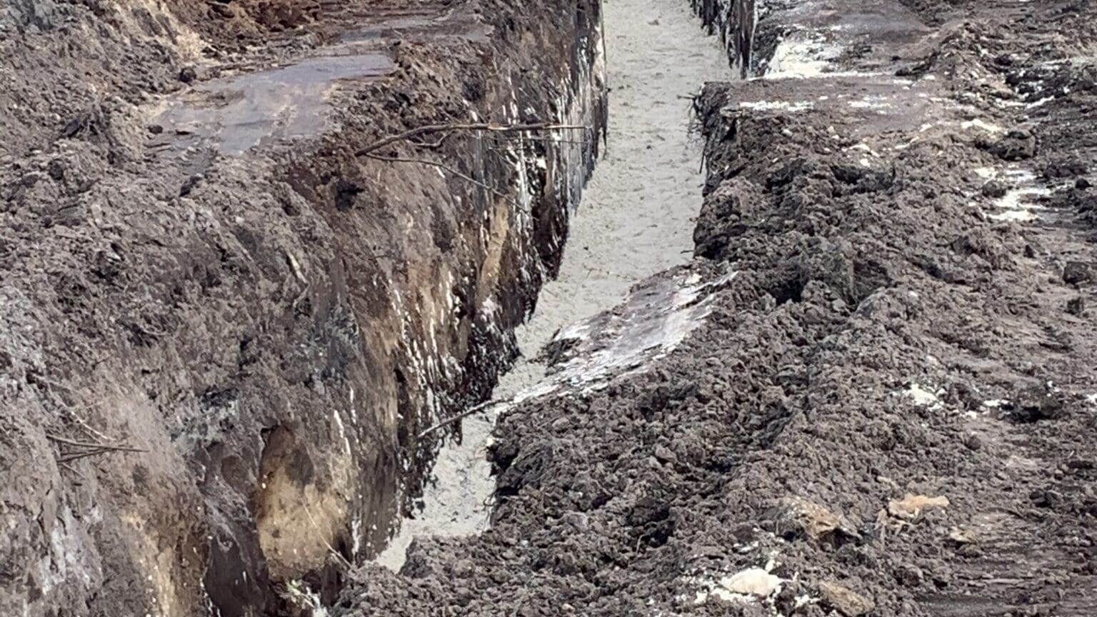 Men working on pipe installation